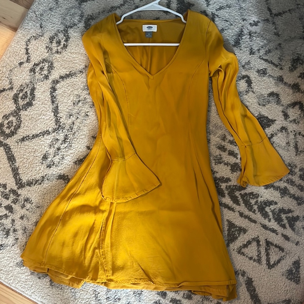 A-line style dress with trumpet sleeves in mustard yellow